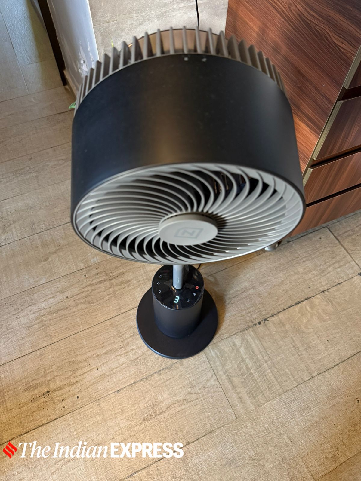 The compact 3D air circulation fan sports an anti-corrosion ABS body, a rust-free coated metal stem, and a fine mesh grid. (Image: Nandagopal Rajan/ The Indian Express)