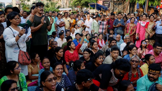 People beryllium   and chant slogans arsenic  they be  a protestation  condemning the rape and execution  of a trainee medic astatine  a government-run hospital, in Kolkata