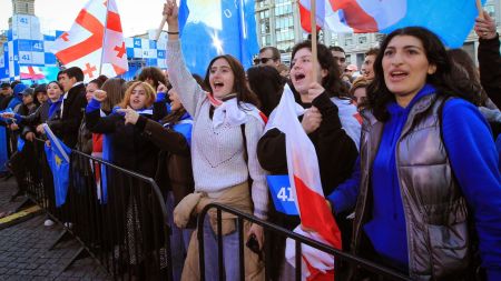 Supporters of the ruling Georgian Dream party attend a rally in the center of Tbilisi, Georgia, Wednesday, Oct. 23, 2024. (AP Photo/Shakh Aivazov)