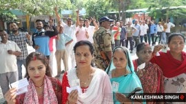 Haryana Exit Poll Results Live: People queue up to cast their votes in Panchkula. (Express photo by Kamleshwar Singh)