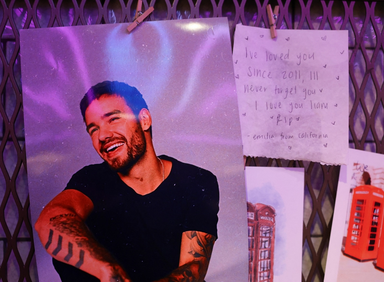 Tributes to Liam Payne, a former One Direction band member, are seen at the Hard Rock Cafe in London's Piccadilly Circus. (Reuters)