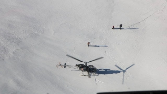 Two foreign women mountaineers, who were stranded at a height of 6,015 metres on the way to the Chaukhamba III peak in Uttarakhand's Chamoli district, being rescued by the Indian Air Force. (PTI)