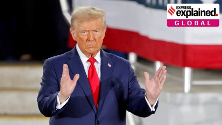 Former U.S. President Donald Trump gestures during a campaign event at Dorton Arena, in Raleigh, North Carolina, U.S. November 4, 2024.