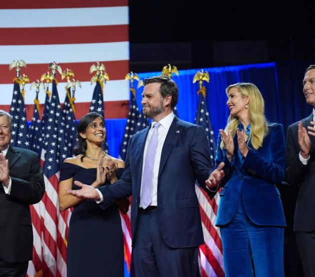 Republican vice presidential nominee Sen. JD Vance, R-Ohio, smiles as from left, Viktor Knavs, Usha Vance, Ivanka Trump and Jared Kushner watch as Republican presidential nominee former President Donald Trump speaks at an election night watch party at the Palm Beach Convention Center