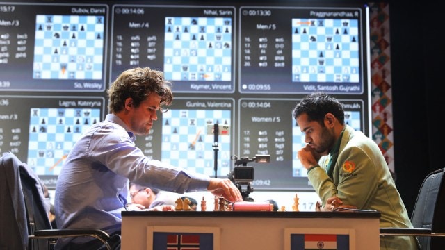 File representation  of Arjun Erigaisi and Magnus Carlsen during their accelerated   lucifer  astatine  the Tata Steel Chess India tournament. (Express photograph  by Partha Paul)