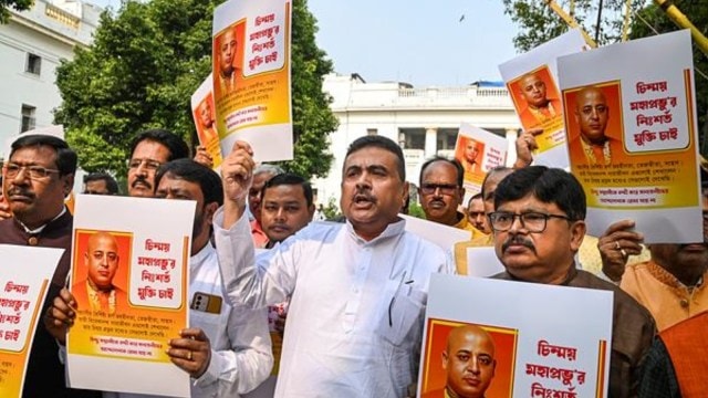 Leader of Opposition successful  West Bengal Assembly Suvendu Adhikari (C) with BJP MLAs during a protestation  against the apprehension  of Hindu assemblage  person  Chinmoy Krishna Das Brahmachari successful  Bangladesh, successful  Kolkata, Tuesday, Nov. 26, 2024. (PTI Photo)