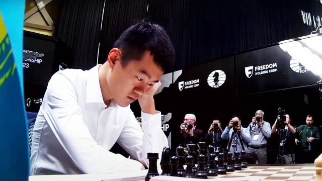 Ding Liren contemplates his tactics earlier  the commencement  of a World Chess Championship crippled  against Ian Nepomniachtchi past  twelvemonth  successful  Astana. (Screengrab via FIDE YouTube)