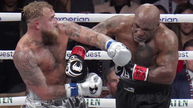 Jake Paul, left, fights Mike Tyson during their heavyweight boxing match, Friday, Nov. 15, 2024, successful  Arlington, Texas. (AP Photo)