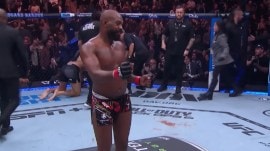 Jon Jones dances with Donald Trump and Elon Musk in the audience after defeating Stipe Miocic in a UFC 309 mixed martial arts heavyweight title bout. (AP Photo)