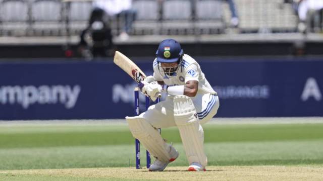 India's KL Rahul ducks to debar  a bouncer during play   successful  the archetypal  cricket trial  betwixt  India and Australia successful  Perth, Australia. (AP)