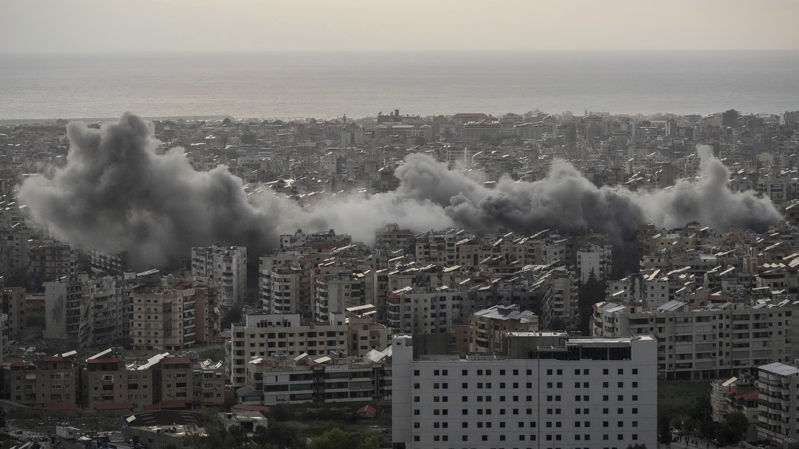 Israeli strikes hit north Lebanon crossings with Syria for first time, minister says