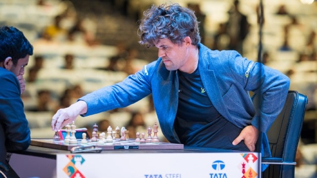 Magnus Carlsen taking on Nihal Sarin at the Tata Steel India chess tournament. (PHOTO: Lennart Ootes)