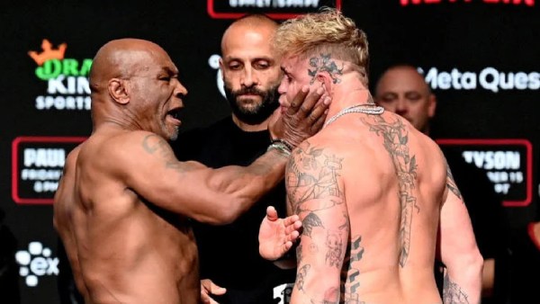 Mike Tyson slaps Jake Paul during the final face-off ahead of the bout in Texas. (X/Netflix)