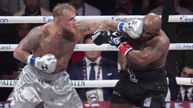 Jake Paul lands a near  to Mike Tyson during their heavyweight boxing match, Friday, Nov. 15, 2024, successful  Arlington, Texas. (AP Photo/Julio Cortez)