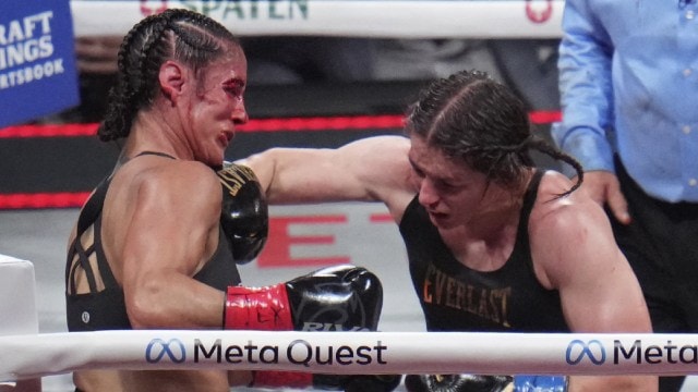 Katie Taylor, right, hits Amanda Serrano during their undisputed ace  lightweight rubric  bout, Friday, Nov. 15, 2024, successful  Arlington, Texas. (AP Photo/Julio Cortez)