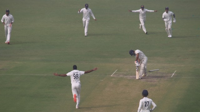 Delhi pacer Simarjeet Singh celebrates after taking Jharkhand's Aryaman Sen's wicket on Day 1 of their Group D Ranji Trophy fixture at the Arun Jaitley Cricket Stadium in New Delhi. (Express Photo by Pratyush Raj)