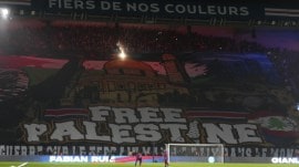 A giant banner reads "Free Palestine" is seen before the Champions League opening phase soccer match between Paris Saint Germain and Atletico Madrid at the Parc des Princes stadium in Paris, Wednesday, Nov. 6, 2024. (AP Photo)