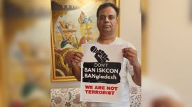 Vice president and spokesperson for ISKCON Kolkata, Radharamn Das holds a placard to protest the atrocities on religious minorities in Bangladesh. (Photo: Radharamn Das/X)