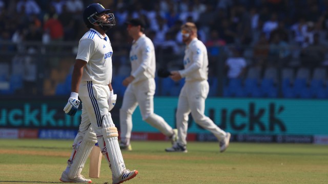 India captain Rohit Sharma walks back after getting out in the second innings of the third Test match against New Zealand. ((Express Photo by Amit Chakravarty)