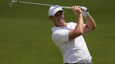 Rory McIlroy, of Northern Ireland, hits out of the seventh fairway during the second round of the Tour Championship golf tournament