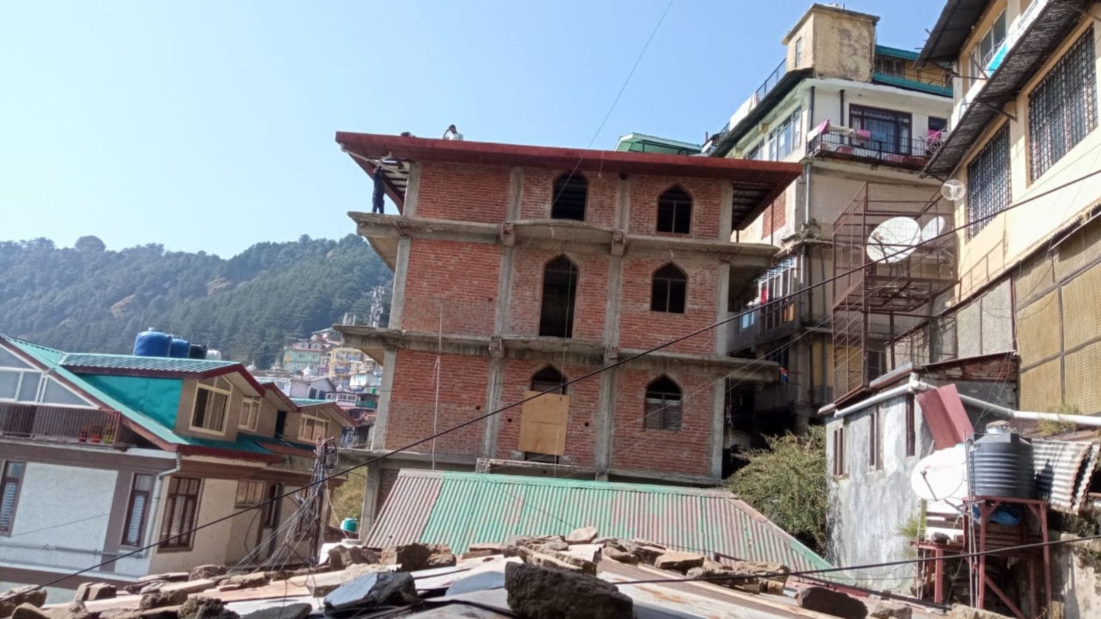 Mohammed Latif, president of Sanjauli mosque committee, said the demolition work was stopped due to shortage of labour in Shimla. (Express Photo)