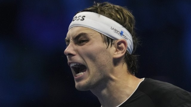 Taylor Fritz of the United States celebrates aft  winning the ATP World Tour Finals semifinal tennis lucifer  against Germany's Alexander Zverevat astatine  the Inalpi Arena successful  Turin, Italy, Saturday, November 16, 2024. (AP Photo)