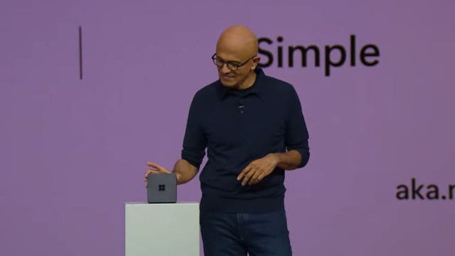 Microsoft CEO Satya Nadella gives a archetypal  look   of the Windows 365 Link instrumentality  astatine  the company's 2024 Ignite conference.