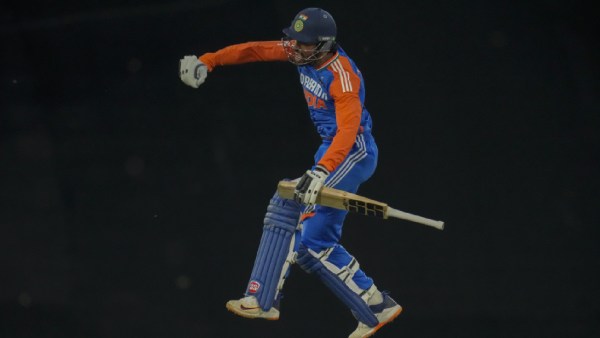 India's Tilak Varma jumps in air as he celebrates after scoring a century during the third T20I match between South Africa and India at the Centurion Park in Centurion on Wednesday. (AP Photo)