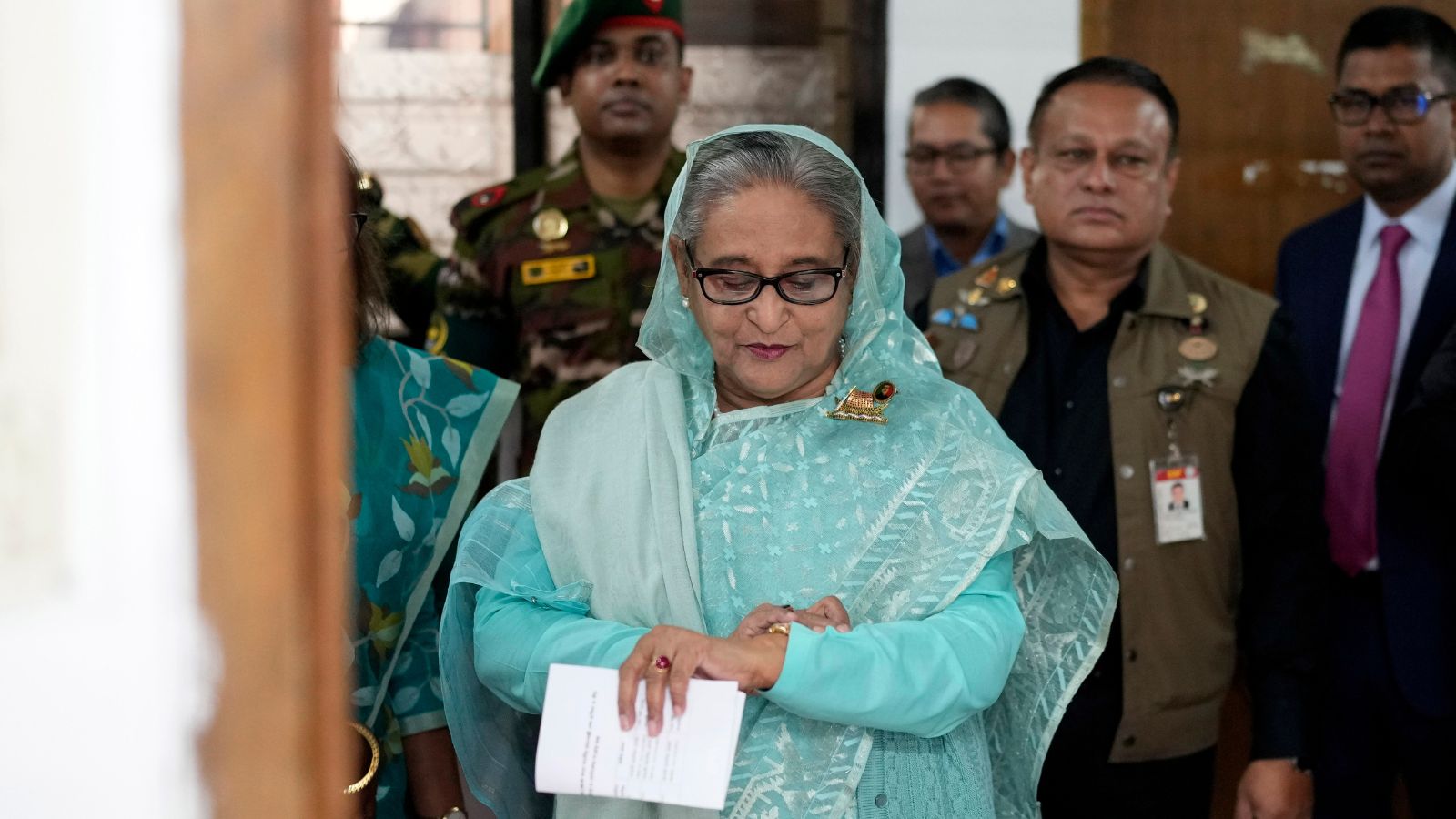 Bangladesh's Hasina claims assassination plot, flees to India.