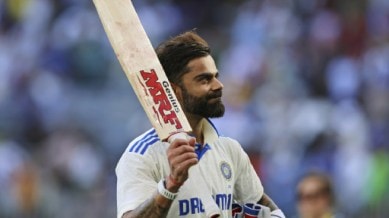 India's Virat Kohli celebrates his century on the third day of the first cricket test between Australia and India in Perth, Australia. (AP)