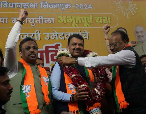 Deputy Chief Minister Devendra Fadnavis received a warm welcome from BJP workers at the BJP office in Mumbai on Saturday. Express Photo By Ganesh Shirsekar