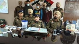 The accused in police custody on Wednesday. Express