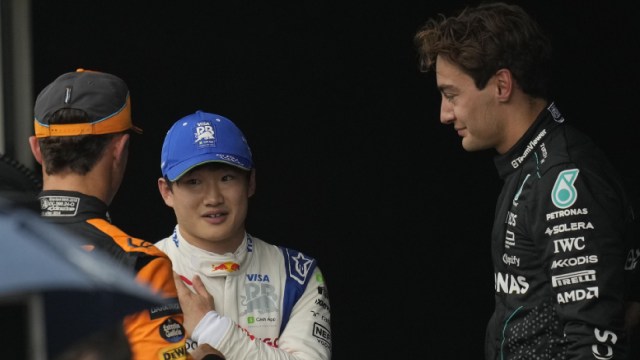 Mercedes' George Russell (right), who is simply a manager  astatine  the Grand Prix Drivers' Association, talks to RB operator  Yuki Tsunoda (center) and McLaren operator  Lando Norris aft  qualifying league   for the Brazilian Formula One Grand Prix. (AP Photo)