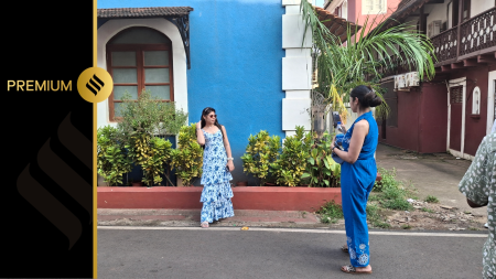 Tourists taking photos in a residential neighbourhood in Goa. (Express photo by Pavneet Singh Chadha)