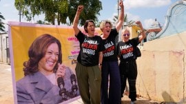 Supporters of US Presidential candidate Kamala Harris who have come all the way from the USA react before participating in a special pooja in Harris' ancestral village of Thulasendrapuram, in Thiruvaarur district. (PTI)