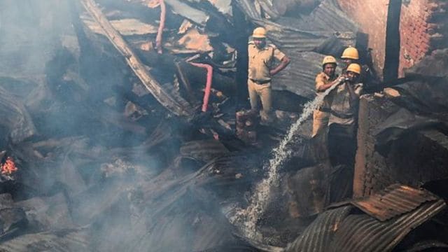 Firemen douse a occurrence  that broke retired  astatine  a timber shop, astatine  Nimtala area, successful  Kolkata