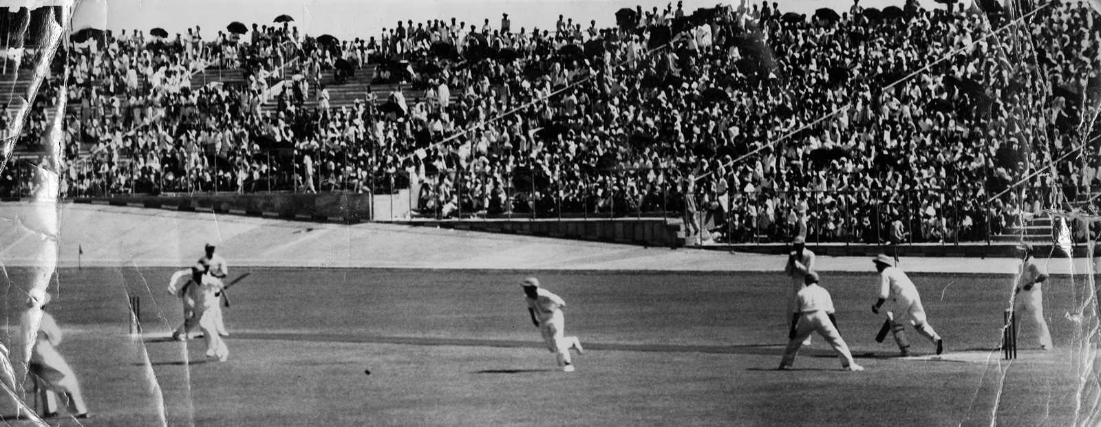 Prime Minister's team at the field during the Parliament cricket match held in aid of the flood relief fund at the National stadium New Delhi on September 13, 1953. Prime Minister Jawaharlal Nehru (C) is seen running to pick up the ball. (Express archive)