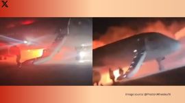 Russian plane catches fire, passengers flee with luggage in tow