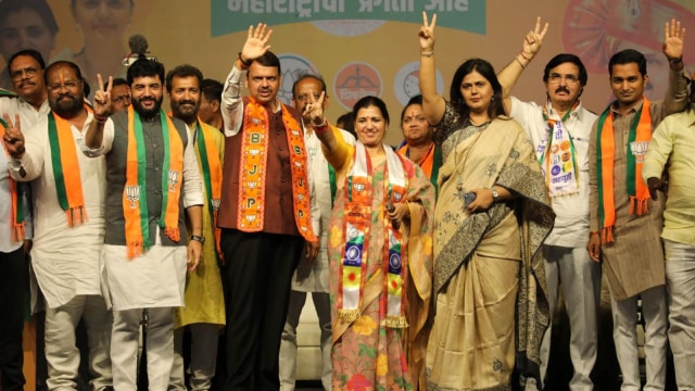 Maharashtra Deputy CM Devendra Fadnavis, Union Minister Muralidhar Mohol and Pankaj’s Munde during the Election rally of BJP Parvati assembly constituency Madhuri Misal astatine  Bibewadi connected  Wednesday. Express photograph   by Arul Horizon.