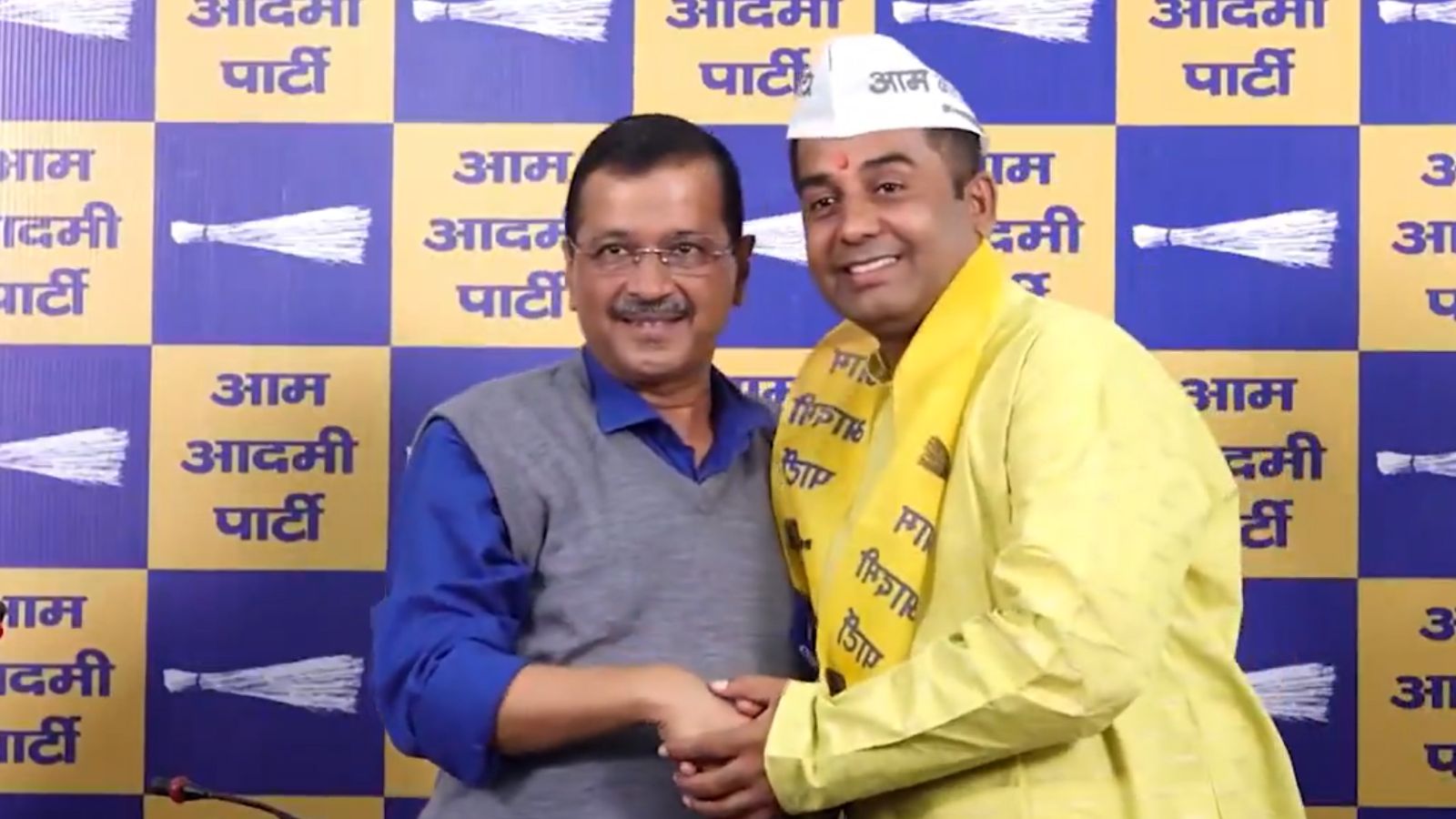 BJP's Jha joins AAP; Gahlot quits amidst Delhi polls.