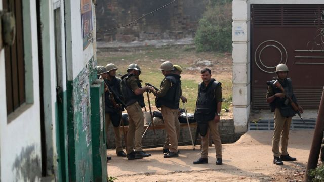 Security personnel stand guard near the Shahi Jama Masjid, days after violent protests against the court-ordered survey of the Mughal-era mosque, in Sambhal.