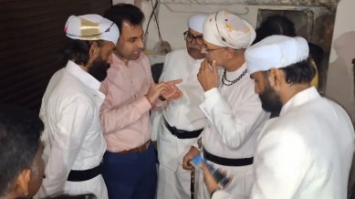 BJP MLA Vishvaraj Singh speaks with officals after he was denied entry into Udaipur Palace, hours after he was anointed the titular head of the erstwhile royal family of Mewar. (PTI)