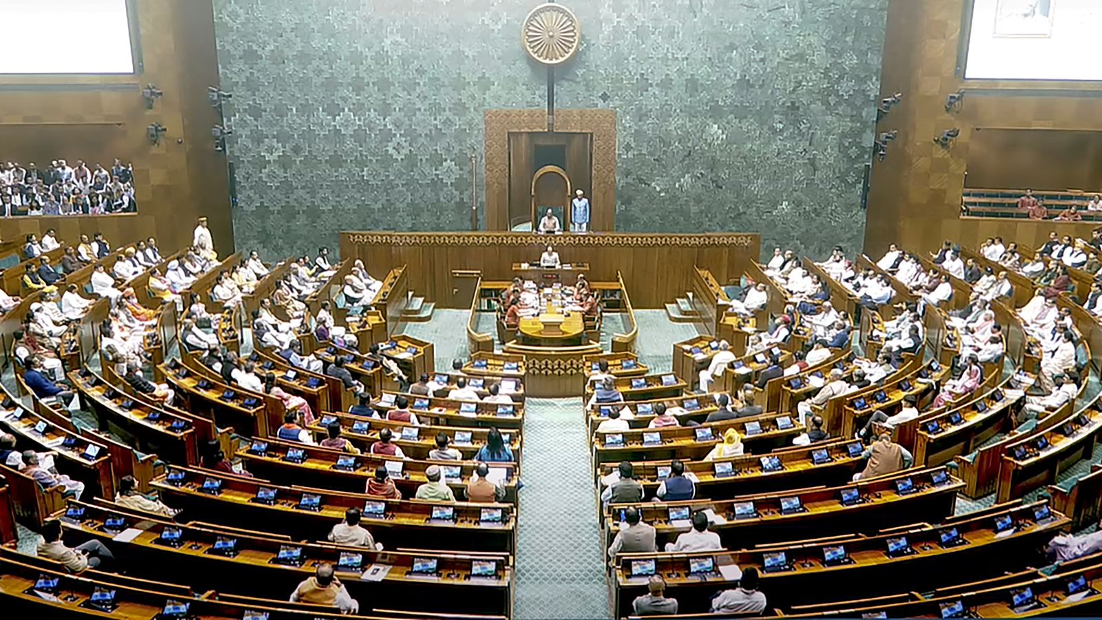 Lok Sabha Speaker Om Birla conducts proceedings in the House during the first day of the Winter session of Parliament