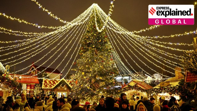 People walk at a Christmas market on Manezh Square in Moscow, Russia December 25, 2024.