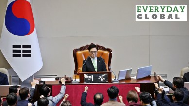South Korea’s ruling People Power Party lawmakers protest against National Assembly Speaker Woo Won-shik during the impeachment vote.
