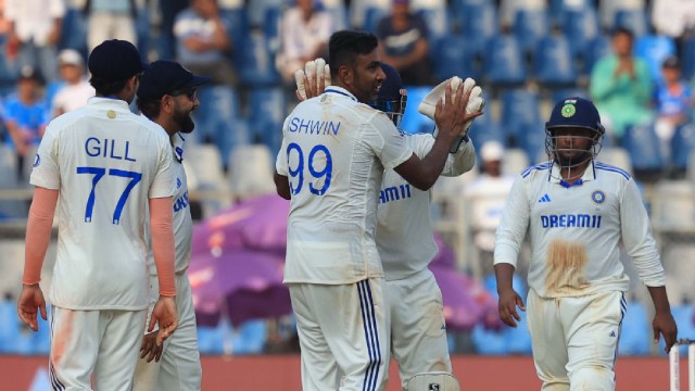 File image of the Indian team including captain Rohit Sharma celebrating R Ashwin taking a wicket in the final Test against New Zealand at the Wankhede Stadium. (Express Photo by Amit Chakravarty)