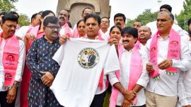 : Bharat Rashtra Samithi (BRS) working president K.T. Rama Rao, centre, with other party legislators during a protest alleging an "unholy nexus" between Chief Minister Revanth Reddy and industrialist Gautam Adani, ahead of the start of winter session of the Telangana Assembly, in Hyderabad