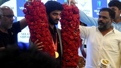 MVM Velmohan (right), owner of the Velammal School, with Gukesh. Photo By Special Arrangement