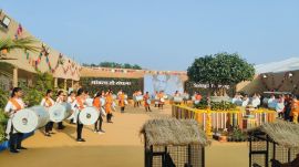 The Bhimthadi Jatra inauguration ceremony began with a dance and dhol-tasha performance by students of College of Agriculture, Pune.