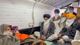 Shiromani Gurdwara Parbandhak Committee (SGPC) President Harjinder Singh Dhami meets farmer leader Jagjit Singh Dallewal, who is on an indefinite fast at Khanauri border at Khanauri border since November 26, in Sangrur district, Punjab